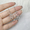 elegante Ohrringe mit doppeltem Twist in Silber